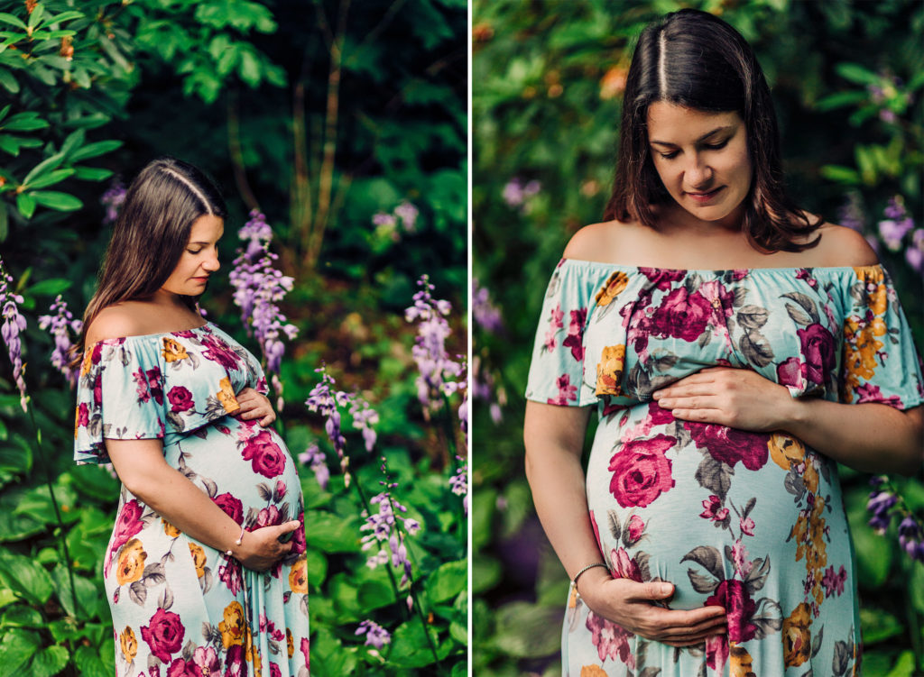 Pregnant woman holding belly during maternity photo session