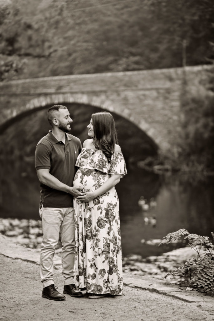 Maternity session with couple near the Wissahickon creek